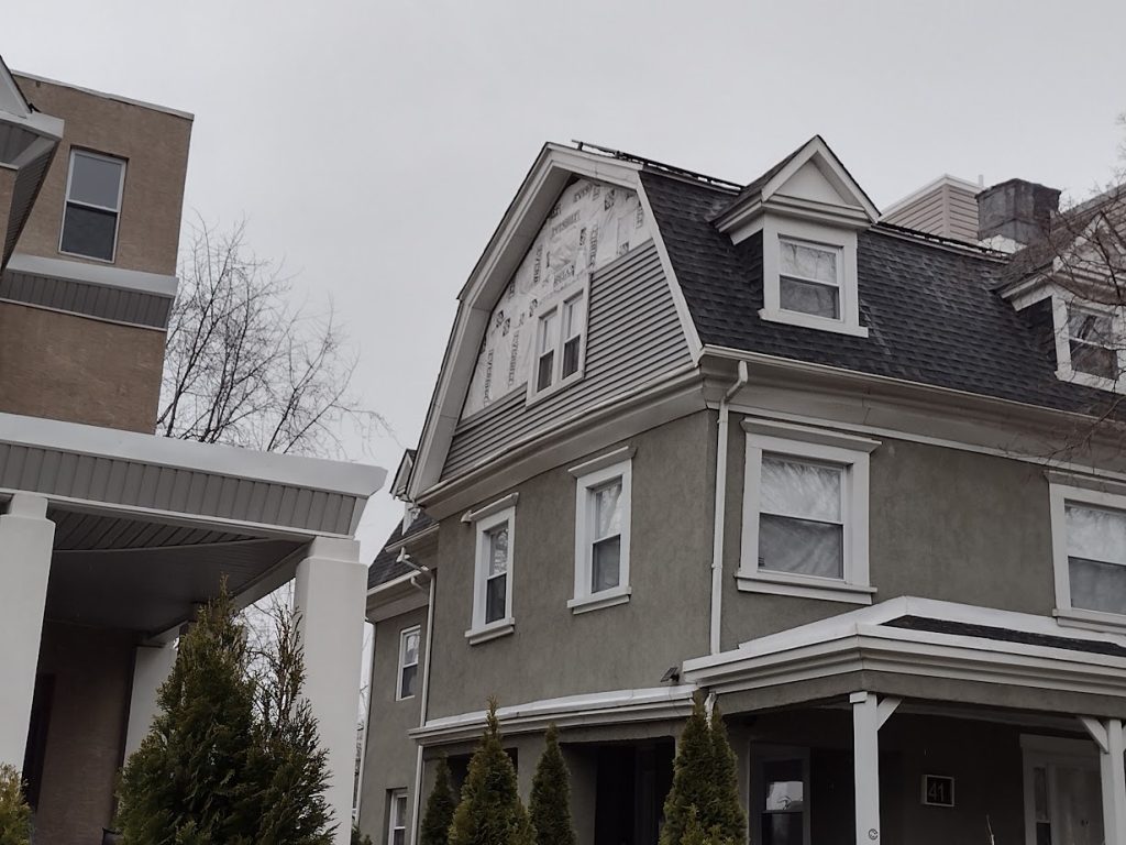 New seamless gutters and siding on a home