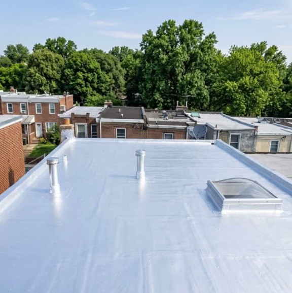 Silver coated flat roof on a Philadelphia rowhome